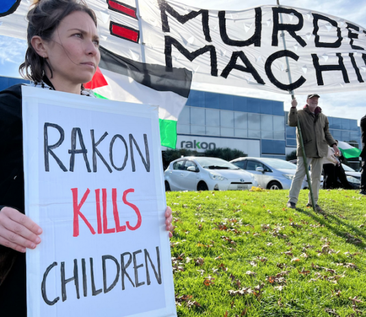 Protesters outside the offices of the electronics manufacturer Rakon