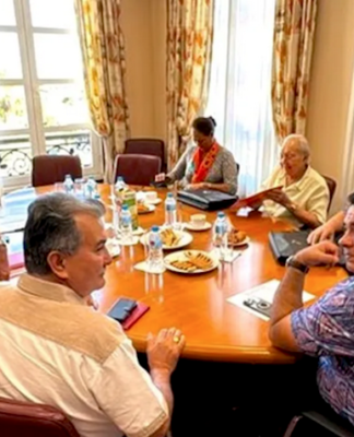 French Polynesia’s pro-France party leaders, including Edouard Fritch (left, standing) are holding back-to-back meetings