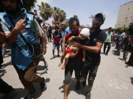 Injured Palestinians, including women and children, are brought to Al Aqsa Martyrs Hospital for treatment