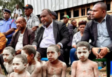 PNG Prime Minister James Marape (second from right) visits the Engan landslide area