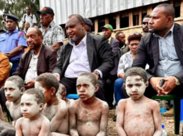 PNG Prime Minister James Marape (second from right) visits the Engan landslide area