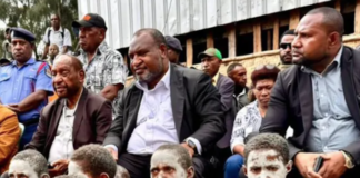 PNG Prime Minister James Marape (second from right) visits the Engan landslide area