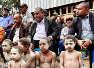 PNG Prime Minister James Marape (second from right) visits the Engan landslide area