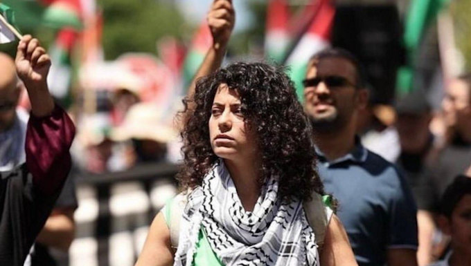 Rana Hamida on the frontline of a recent Auckland march against genocide