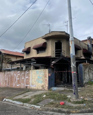 A torched home in Nouméa's Vallée-du-Tir