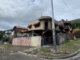 A torched home in Nouméa's Vallée-du-Tir