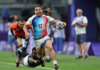 France’s Antoine Dupont races away from the Fiji defence