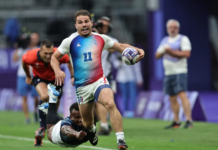 France’s Antoine Dupont races away from the Fiji defence