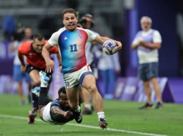 France’s Antoine Dupont races away from the Fiji defence