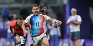 France’s Antoine Dupont races away from the Fiji defence