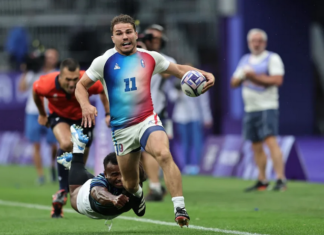 France’s Antoine Dupont races away from the Fiji defence