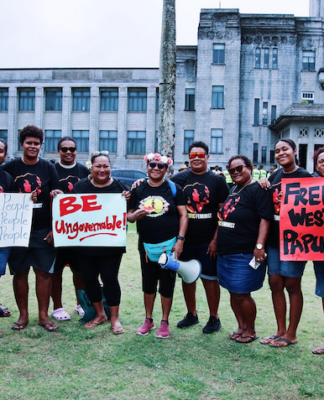 Decolonisation protesters outside Parliament during the "Kanaky and West Papua" demonstration in the Fijian capital Suva yesterday