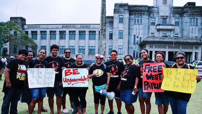 Decolonisation protesters outside Parliament during the "Kanaky and West Papua" demonstration in the Fijian capital Suva yesterday