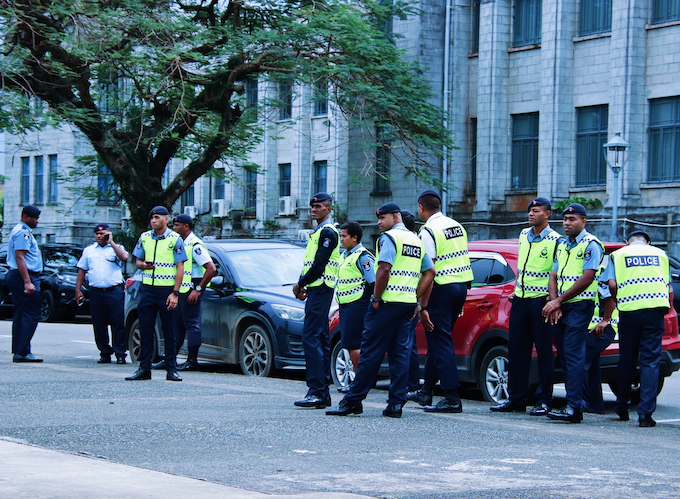 Fiji police at Parliament yesterday on watch for the Pacific human rights protest