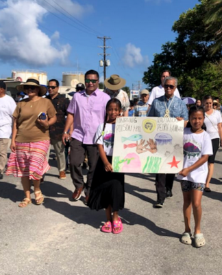 Hundreds of people marched in Majuro, capital of the Marshall Islands, on March 1