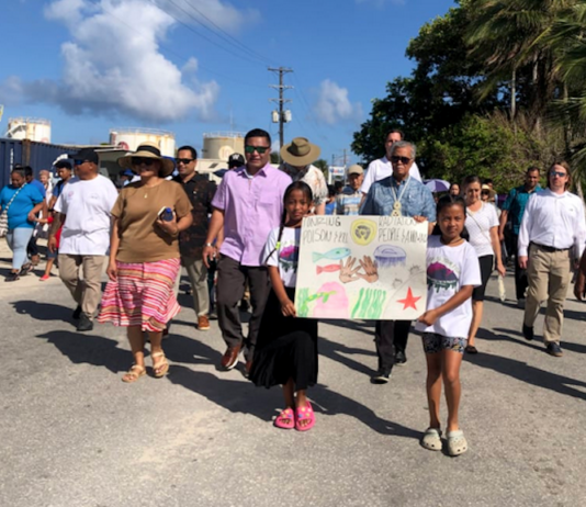 Hundreds of people marched in Majuro, capital of the Marshall Islands, on March 1