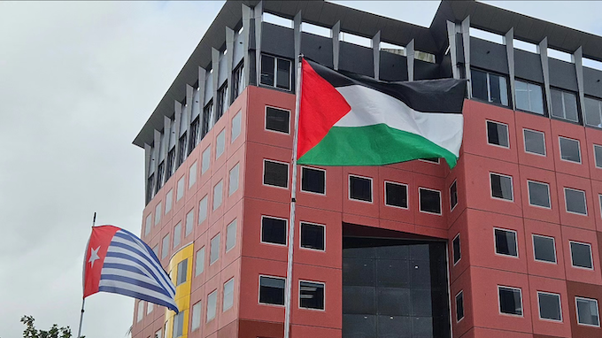 The West Papuan Morning Star and Palestinian flags for decolonisation fluttering high in downtown Suva