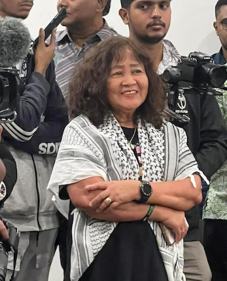 Designer Del Abcede at the media crush in last month's 30th anniversary celebration of Pacific Journalism Review