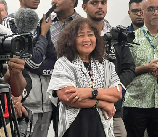 Designer Del Abcede at the media crush in last month's 30th anniversary celebration of Pacific Journalism Review