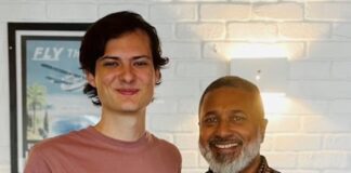 QUT student journalist Maxim Bock with Fiji TV's director of news, current affairs and sports Felix Chaudhary (right)