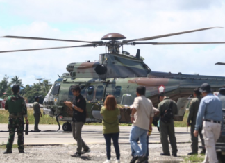 An Indonesian Air Force helicopter prepares to fly to Timika