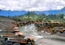 Idle trucks at Porgera mine in Papua New Guinea