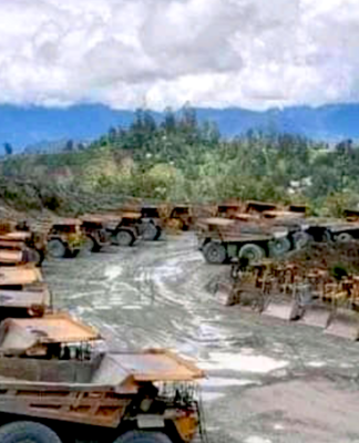 Idle trucks at Porgera mine in Papua New Guinea