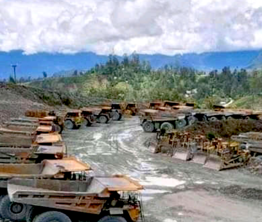 Idle trucks at Porgera mine in Papua New Guinea