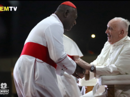 PNG's Catholic Archbishop of Port Moresby Cardinal Sir John Ribat welcomes Pope Francis during his four nation Pacific and Southeast Asian tour