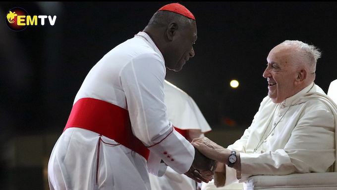 PNG's Catholic Archbishop of Port Moresby Cardinal Sir John Ribat welcomes Pope Francis during his four nation Pacific and Southeast Asian tour
