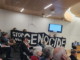 NZ’s Labour calls on other cities to follow Israel boycott lead Christchurch citizens hold up a "Stop the genocide" banner before yesterday's council vote