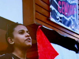 A Fiji protester at the weekly vigil for a Gaza ceasefire and decolonisation in Palestine, Kanaky and West Papua at the Fiji Women's Crisis Centre