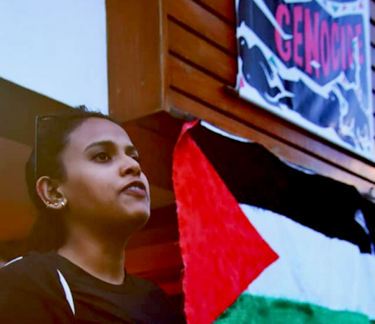 A Fiji protester at the weekly vigil for a Gaza ceasefire and decolonisation in Palestine, Kanaky and West Papua at the Fiji Women's Crisis Centre