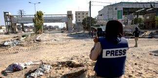 Photojournalist Doaa al Baz working in Gaza