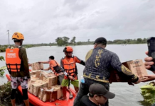 Filipino rescuers at work in Mangcayo barangay near Vinzons, Bicol