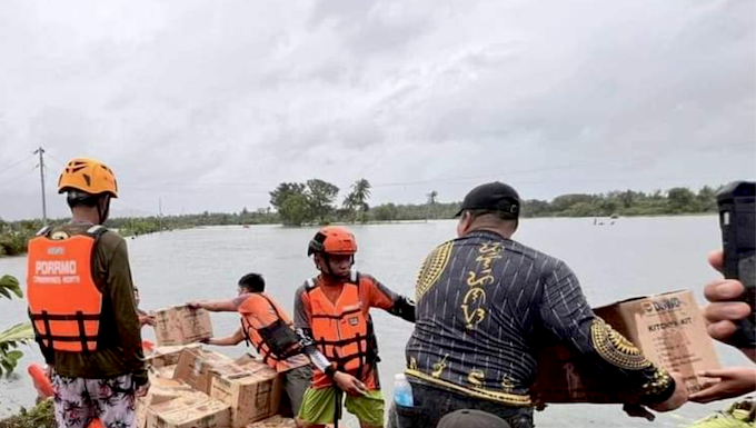 Filipino rescuers at work in Mangcayo barangay near Vinzons, Bicol
