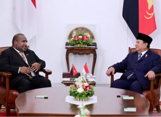 PNG Prime Minister James Marape (left) meeting with new Indonesian President Prabowo Subianto