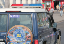 A police landcruiser patrols the streets of the Papua New Guinea's capital Port Moresby