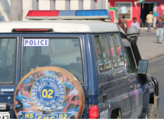 A police landcruiser patrols the streets of the Papua New Guinea's capital Port Moresby