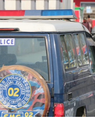 A police landcruiser patrols the streets of the Papua New Guinea's capital Port Moresby