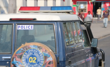 A police landcruiser patrols the streets of the Papua New Guinea's capital Port Moresby