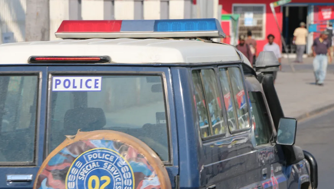 A police landcruiser patrols the streets of the Papua New Guinea's capital Port Moresby