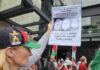 A New Zealand protester at a pro-Palestinian rally in Auckland on Saturday calling for immediate sanctions and the expulsion of the Israel ambassador