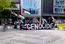 "Drop the genocide" banner at today's protests against Israel's war on Gaza in Christchurch Ōtautahi