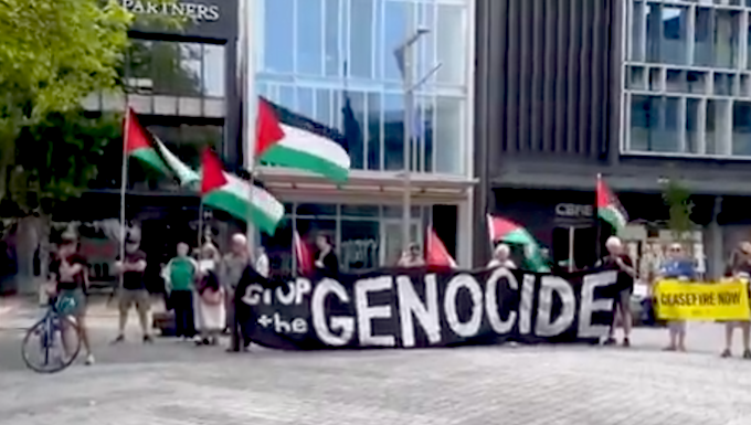 "Drop the genocide" banner at today's protests against Israel's war on Gaza in Christchurch Ōtautahi