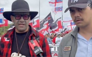 Te Maori Pati leader Rawiri Waititi talks to an RNZ reporter at Hīkoi mō te Tiriti