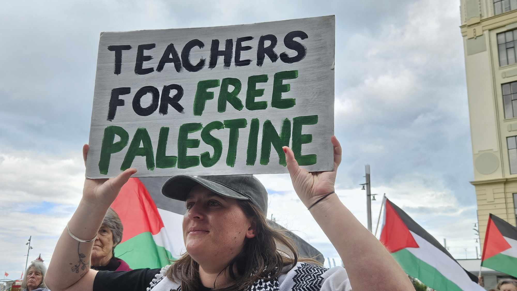 A "Teachers for free Palestine" placard at Saturday's solidarity rally for Palestine in Auckland