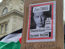 "Zion Times - Sanction Israel now" Bibi commits genocide - war criminal"