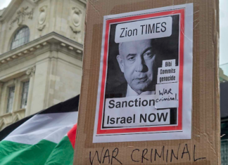 "Zion Times - Sanction Israel now" Bibi commits genocide - war criminal"