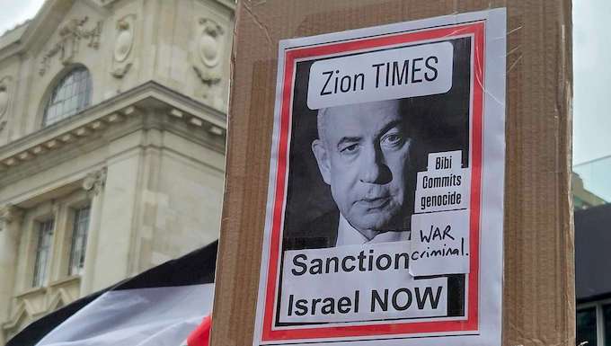 "Zion Times - Sanction Israel now" Bibi commits genocide - war criminal"